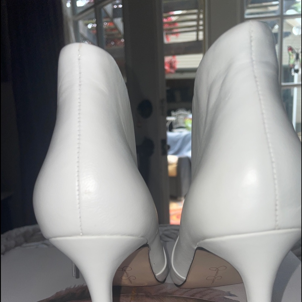Beautiful white booties size 7 1/2 brand new Jessica Simpson stilettos